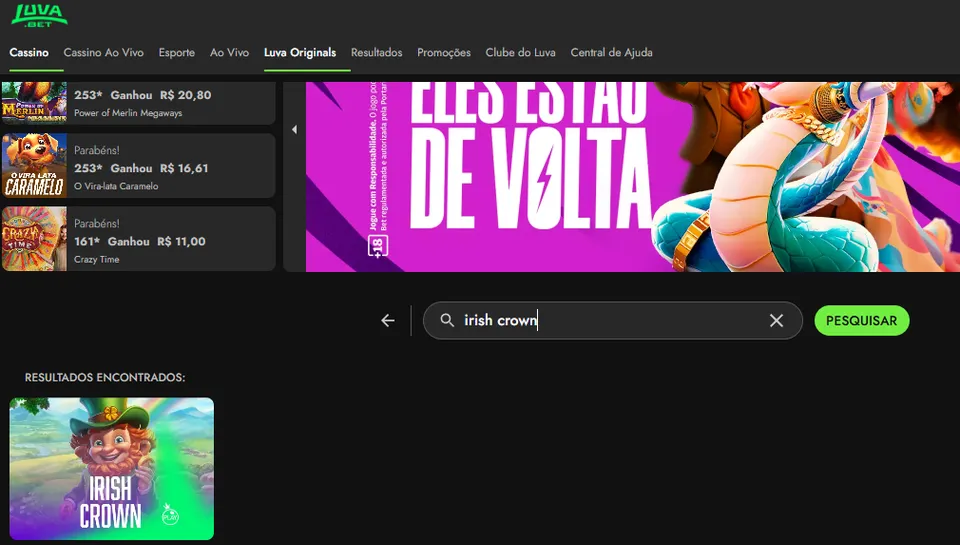 Página do site da Luvabet exibindo o jogo "Irish Crown" na seção de busca, com destaque para o personagem leprechaun sorridente e elementos gráficos coloridos. A interface mostra o menu principal, barra de pesquisa e jogos populares à esquerda.